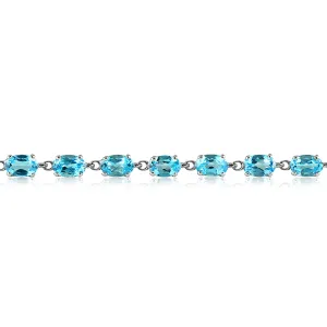10 1/2 Carat Oval Blue Topaz Bracelet In 10K White Gold