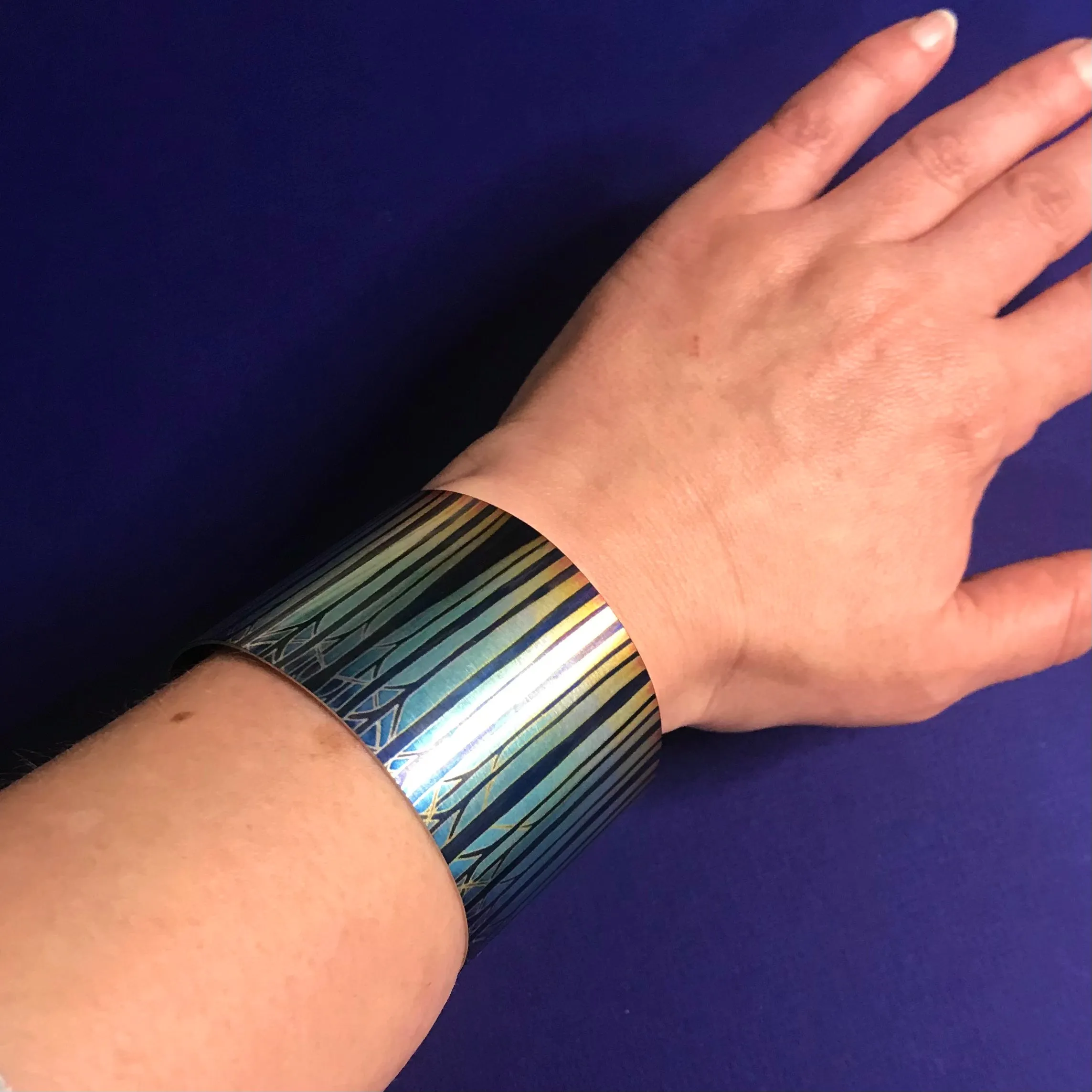 Cathedral Tree Stripes Bracelet in rich stained glass sunset colours- easy wear lightweight aluminium.
