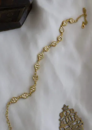 Gold Plated Head Band With Intricately Cardved Kundan